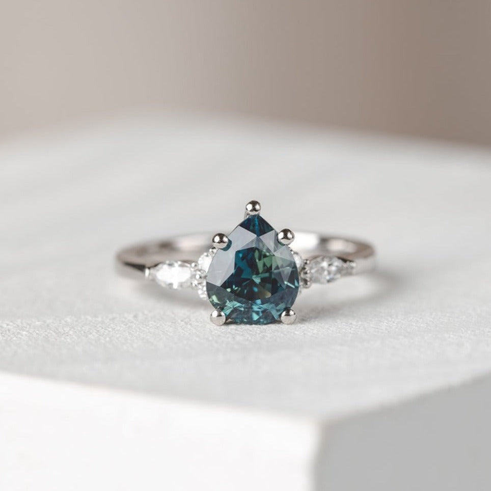 Pear Teal Sapphire Engagement Rings
