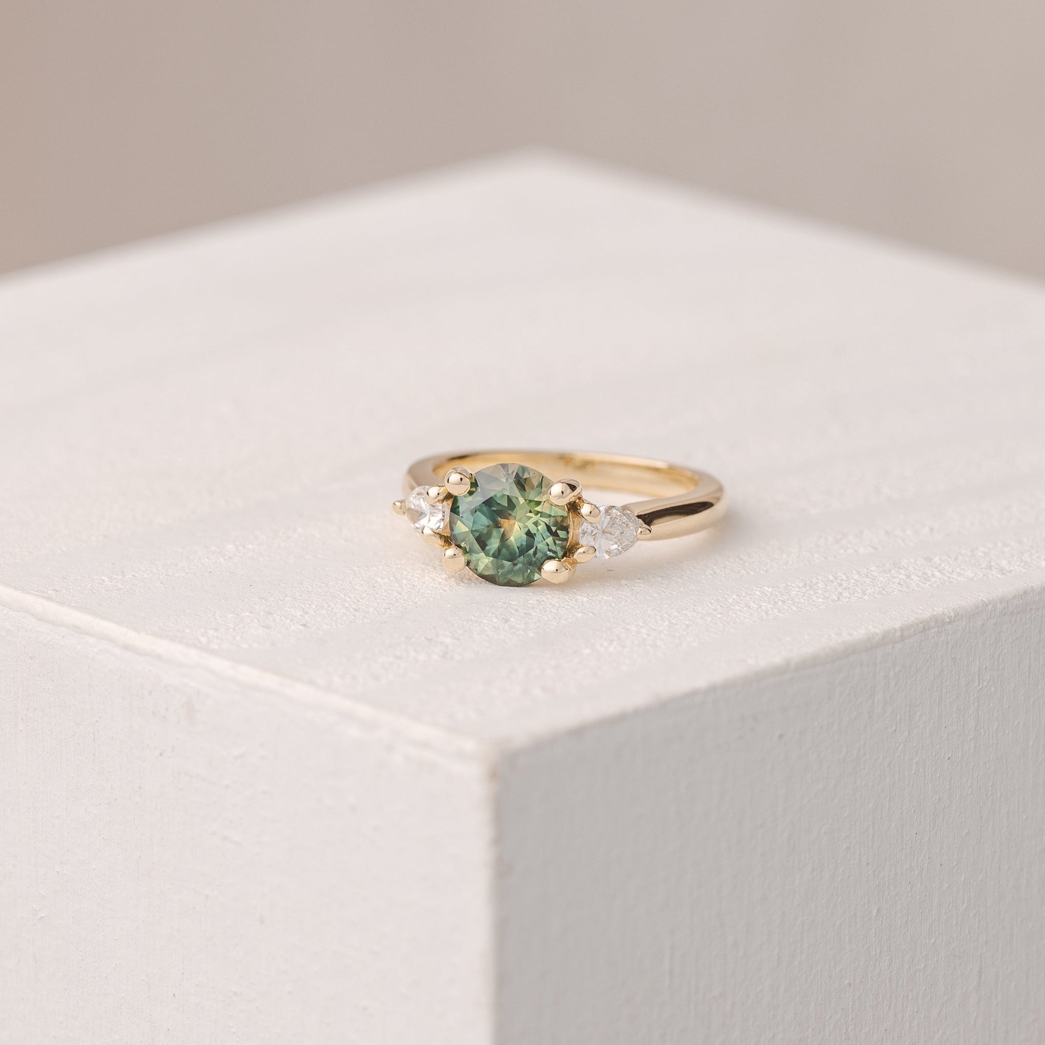 Charlotte Round 1.66ct Australian Sapphire and Petite Pear Trilogy Engagement Ring